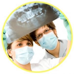 Dentist Looking X-ray dentist looking x-ray image